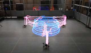 Ces drones fabriquent une tour en 3D